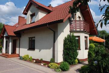 Фото номера Вилла с 3 спальнями Виллы Dom z ogrodem г. Лиманова 18
